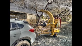 A timelapse, A timewarp, A Crosstrek and a wood chipper