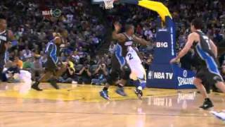 Dwight Howard rejects Nate Robinson's layup attempt into the third row.