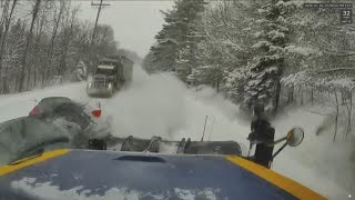 Video shows car struck by plow after trying to pass tractor trailer