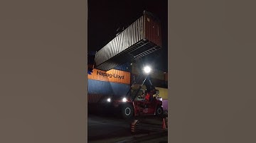 Kalmar Reach stacker with a tilting spreader for container handling #kalmar #reach #driving