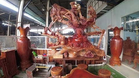 Gốc gỗ nguyên khối chạm khắc Di Lặc với Ngủ Tiểu Linh Đồng (Rộng 2m8 cao 2m5 sâu 60cm)