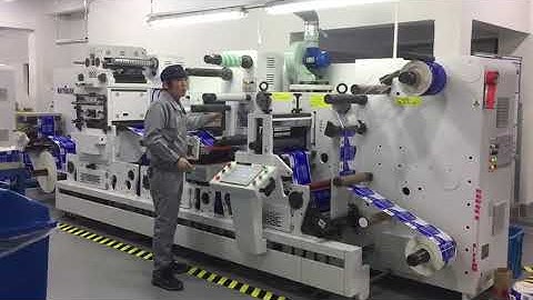 RHYGUAN PLUS-330 ROLL TO ROLL LABEL FINISHING SOLUTION