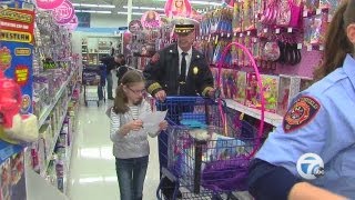 Children's holiday brightened with "Shop with a Hero" event