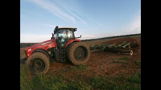 Cutting land with Versatile 310 and John Deere 637
