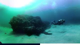 Scuba diver swimming underwater. Berlenga Island, Portugal 4K VR 360º 3D