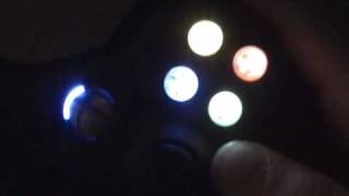 Xbox 360 controller repainted with Duke thumsticks, and LEDs under the buttons