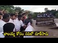 Fan jumps into river to meet MLA Balakrishna, visuals