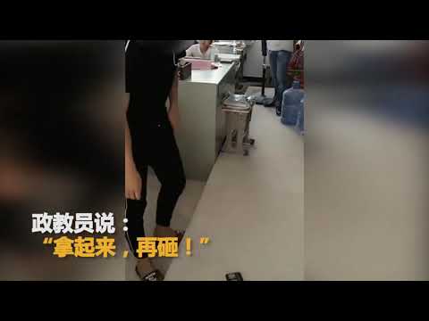 学生轮流上讲台砸手机 老师：自愿砸的