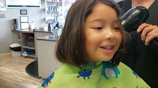 first time haircut for Mimi and Zoila