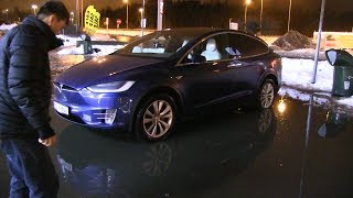 Summon Tesla Model X out of water puddle
