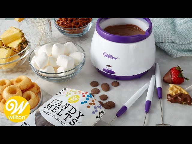 Wilton Cake Decorating - A melting pot that's easy to clean? You bet!  Wilton Candy Melts™ Candy Melting Pot has a silicone pot. When you're done,  just let the melted candy harden