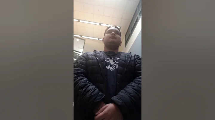 Samuel waits for someone to go to his booth at the...