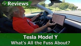 Russell takes the tesla model y for a short test drive and shares his
opinions