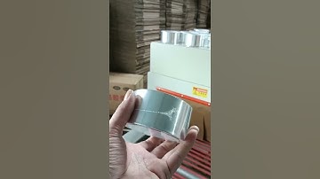 Automatic shrink wrapping packing machine