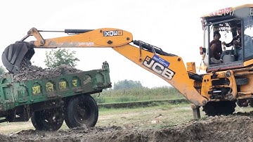 JCB Backhoe Loading on The River Mix Ballast Tractor