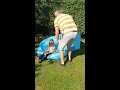Moment four-year-old girl is sent flying in the air after uncle sits on inflatable bed next to her