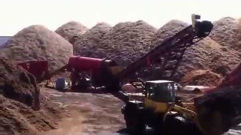 MULCH LOADING  BIG TRUCKS AT  BRINK WOOD PRODUCTS YARD