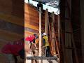 Mastering Beam Alignment: Smart Clamping Technique for Perfect Wood Installation.