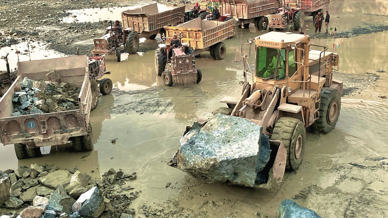 Massive Rock Loading Show By Powerful 966 Wheel Loader 