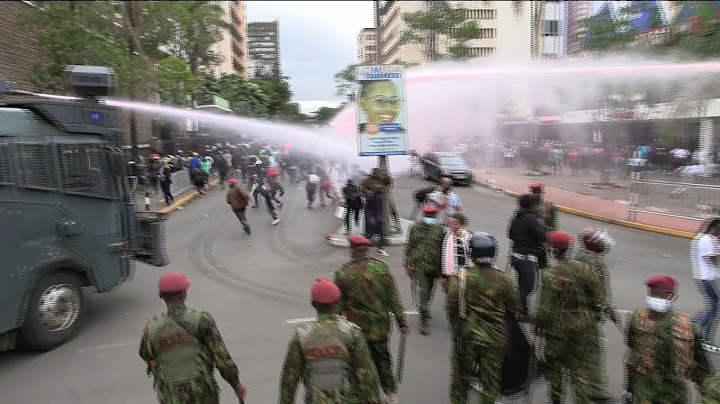 Police fire water cannons and tear gas at Kenyans protesting tax hikes | AFP