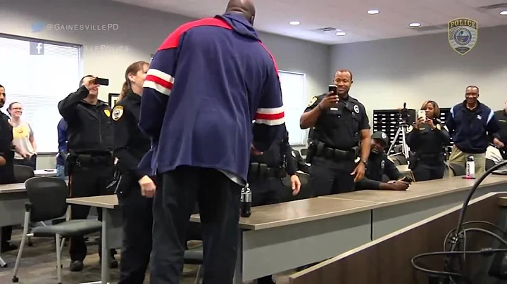 Shaquille O'Neal plays pickup basketball with kids and cops