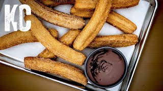 HOMEMADE CHURROS WITH CHOCOLATE SAUCE | Churros Mexicanos
Homemade Churros With Chocolate Sauce? Yes, please! The preparation of this simple dessert is so incredibly easy even a caveman could do it. It requires deep-frying so be brave, be bold and go for it! You will be justly rewarded in the end.
What are churros? Churros are a sweet treat of fried dough typically rolled in sugar and cinnamon. They are usually served with a dipping sauce like thick hot chocolate or dulce de leche. Sometimes youll find churros stuffed with chocolate, cajeta or pastry creme.
LINKS
Instagram - https://www.instagram.com/kitchencraftfood/
Website: https://kitchen-and-craft.com/
SUPPORT MY CHANNEL
Patreon - https://www.patreon.com/kitchenandcraft
PayPal - kitchencraftfood@gmail.com
Bitcoin - 344o7PgkuMDFQU8P6dLw9UYorpAhHWaawn
Ethereum - 0xd955827A5B1f3fDEa18dA8dA196F830590F281eE
Litecoin - LWq4uMk76kRJiJMgr1fk8FQVjYDPAxrJHi
––––––––––––––––––––––––––––––––
Written recipe instructions are here:
https://kitchen-and-craft.com/churros-with-dark-chocolate-sauce/
CHECK OUT THESE OTHER VIDEOS:
Bombolini, Italian Donuts with Vanilla Pastry Cream - https://youtu.be/WActrrC9cr0
Caramel DeLite Whoopie Pies - https://youtu.be/fECHWryShgA
Simple Panna Cotta with Blueberries and Basil - https://youtu.be/dwS2KiwmUZA
––––––––––––––––––––––––––––––––
CHURROS WITH DARK CHOCOLATE SAUCE
(makes about 15-18 churros)
For the Churros Dough:
Unsalted Butter, 1oz. | 28g
Granulated Sugar, 1.5 tsp.
Kosher Salt, 3/4 tsp.
Water, 1Cup | 8 fl. oz. | 227g
All-Purpose Flour, 1 Cup | 4.25 oz. | 120g
Eggs, 2 each
For the Dark Chocolate Sauce:
Heavy Cream, 1/2 Cup | 4 fl. oz. | 114g
Dark Chocolate (60% Cacao recommended), about 1/2 Cup | | 3 oz. | 85g
For the Cinnamon-Sugar Mix:
Granulated Sugar, 1 Cup | 7 oz. | 198g
Ground Cinnamon, 1 1/2 tsp.
––––––––––––––––––––––––––––––––
EQUIPMENT THAT I USE (Affiliate Links)
Ateco #824 Star Pastry Tip - https://amzn.to/2Khl3ww
Ateco #825 Star Pastry Tip - https://amzn.to/2YHTSi6
Disposable Piping Bags (16 length) - https://amzn.to/31h8pD7
Cast Iron Tortilla Press - https://amzn.to/2Y8U2yV
Lodge 12 Cast Iron Pan - https://amzn.to/2JZ6kEO
Lodge Cast Iron Griddle (10 x 20) - https://amzn.to/2Od4XIh
Tojiro DP Utility/ Petty Knife - https://amzn.to/2SwHz6M
Mac 6 Curved Boning Knife - https://amzn.to/2XYPvUv
KitchenAid Pro Line 7 Qt. Stand Mixer - https://amzn.to/2XVCdbn
KitchenAid Pasta Roller Attachments - https://amzn.to/2JZ8d4m
Cuisinart 14 Cup Food Processor - https://amzn.to/2O7XJFg
Ooni 3 Portable Pizza Oven - https://amzn.to/2SwIi80
Gas Burner Attachment for Ooni 3 Pizza Oven - https://amzn.to/2Y2JDd6
Pasta alla Chitarra Pasta Cutter with Rolling Pin - https://amzn.to/2YaMXh8
Gnocchi Rolling Board - https://amzn.to/2Y9M48D
All-Clad Stainless Steel 7 Qt. Pasta Pot with Strainer - https://amzn.to/2SuuhI9
All-Clad Stainless Steel 10 Fry Pan - https://amzn.to/2JVHt50
All-Clad Stainless Steel 14 Fry Pan - https://amzn.to/2SuRZE9
All-Clad Stainless Steel 1.5 Qt. Sauce Pot - https://amzn.to/2Y8QOvs
Le Creuset Enameled 11.75 Cast Iron Skillet - https://amzn.to/2JVZFLT
Fujifilm X-H1 Mirrorless Camera - https://amzn.to/2Ybcmrh
Fujifilm 35mm f1.4 Lens - https://amzn.to/2Ymn7Lo
Fujifilm 18mm f2 Lens - https://amzn.to/2JR6xtG
(Non-Affiliate Links)
Anryu Kurouchi Gyuto 240mm - https://tinyurl.com/y5rn3b8c HOMEMADE CHURROS WITH CHOCOLATE SAUCE | Churros Mexicanos