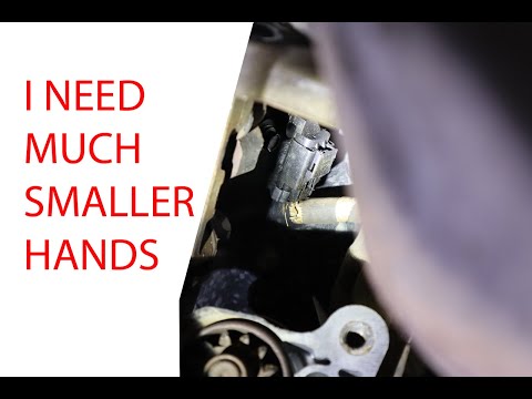 Video: Di manakah sensor engkol pada Chrysler 300 2006?