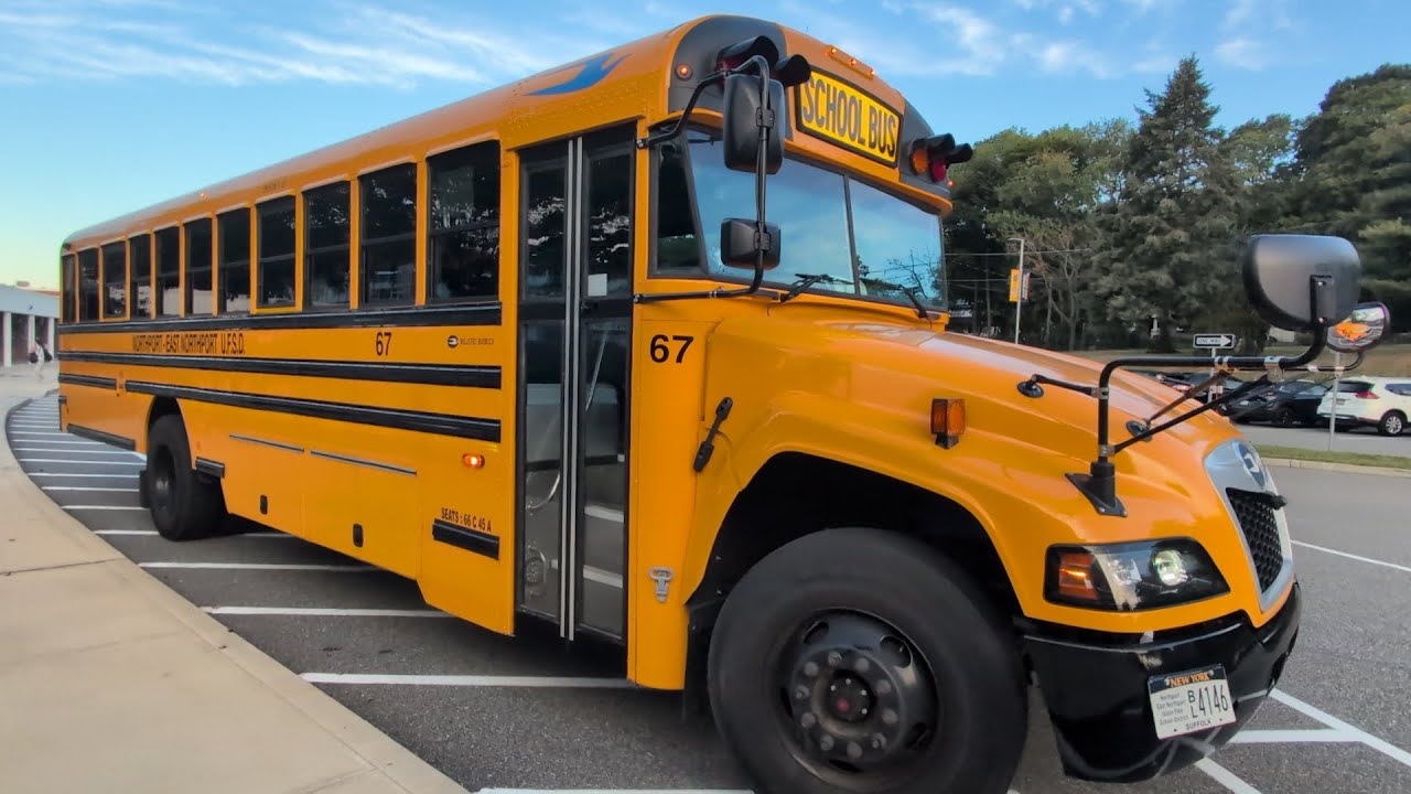 School buses with their lights on!! School Buses leaving the school 