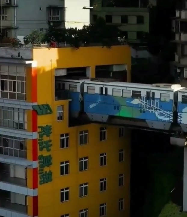 Chinese Metro Runs through Residential Building in Chongqing, China