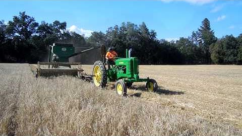 John Deere 42 combine harvesting oats