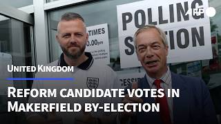 Reform candidate in crunch UK by-election casts vote alongside Farage | AFP