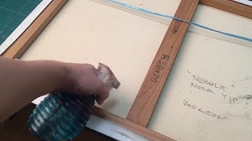 Removing crease or dent on canvas painting