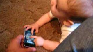 Baby uses iPhone (iTunes coverflow)