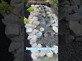 Pondless waterfall install!!  #landscaping #hardscaping #waterfall #waterfeature #fyp #like #viral