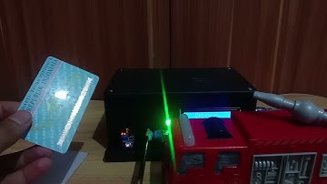 PROTOTYPE SISTEM KEAMANAN PARKIR OTOMATIS BERBASIS RADIO FREQUENCY IDENTIFICATION (RFID)