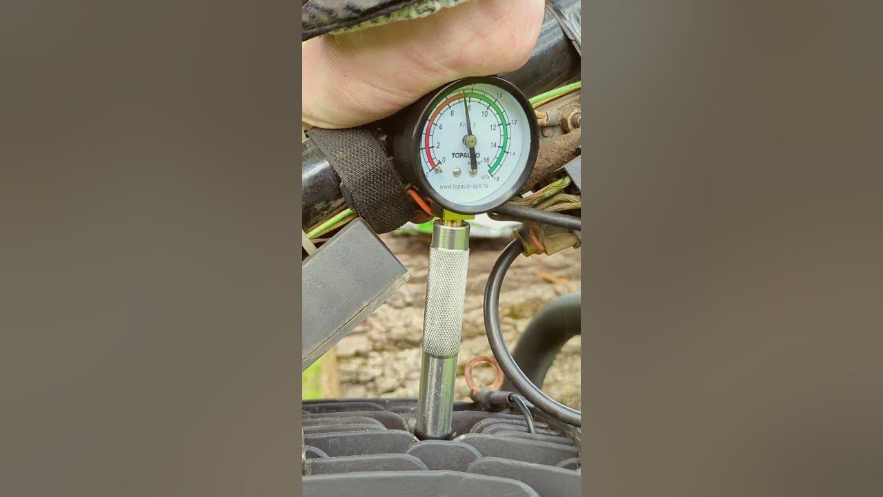 Видео как замерить компрессию на снятом моторе