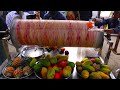 Mix fruits ice cream making on hand roller summer special  bangladeshi street food