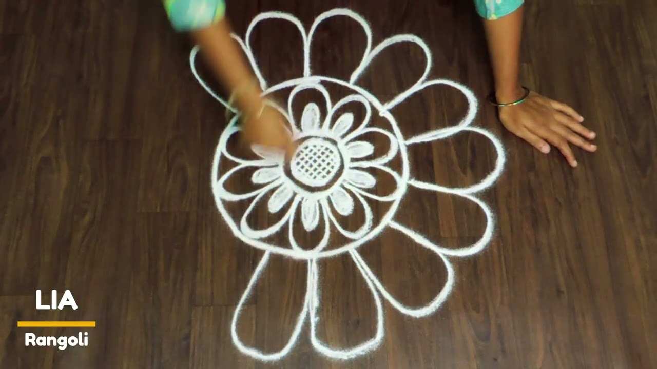 elegant kolam creations / rangoli by lia / flower design rangoli / simple kolam designs