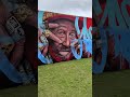 Incredible artist painted mural at Austin Reggae Festival 2026