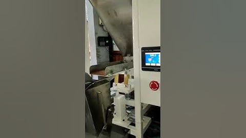 single head weigh filler for granular free flowing material. Motorised