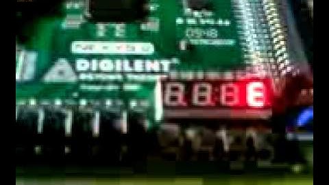 TEXT MESSAGE IN SEVEN SEGMENT DISPLAY USING NEXYS2 FPGA
