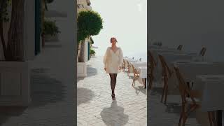 Elegance by the sea, walking with style and grace. ✨🖤 #SheerTights #ChicLook #BalletFlats  #tights