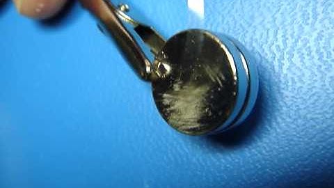 Oscillating wire on a magnet