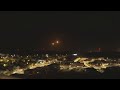 Flares and explosions light up night sky over Gaza Strip as Israel continues military operation
