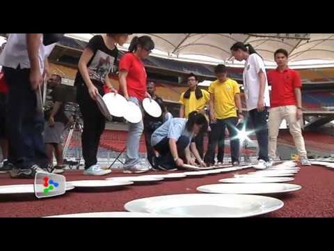 26,213 washed plates break Guiness World Record