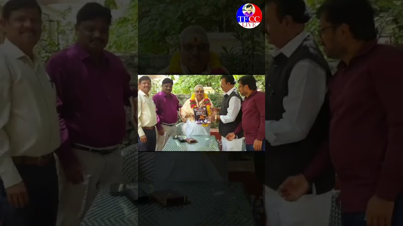 Dr.R.K.Goud giving TFCC Nandi Awards Brochure to Supreme Court Advocate Varaprasad with Ravikumar CA