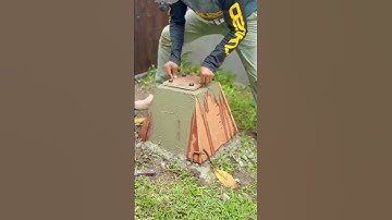 Manual embedding process of steel bars into the cement column base