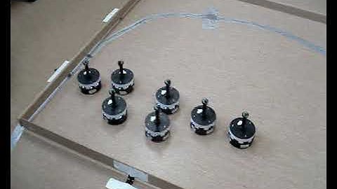 Self-organized flocking in mobile robots