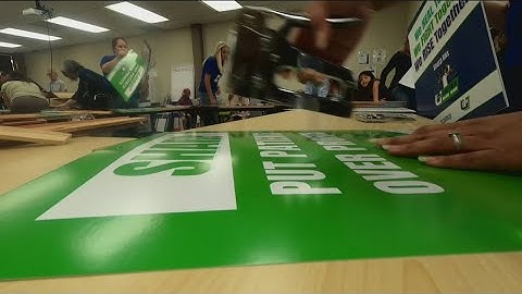 Sharp nurses make signs ahead of informational picket on Wednesday