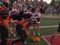 Football Team Gives Roses to Ill Cheerleader